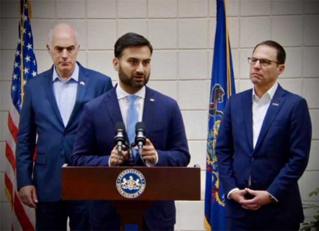Professor Zaidi speaking at a press conference with PA Governor Josh Shapiro